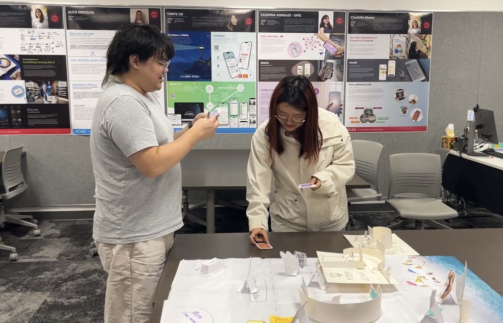 Participant interacting with the paper mirror screen during testing