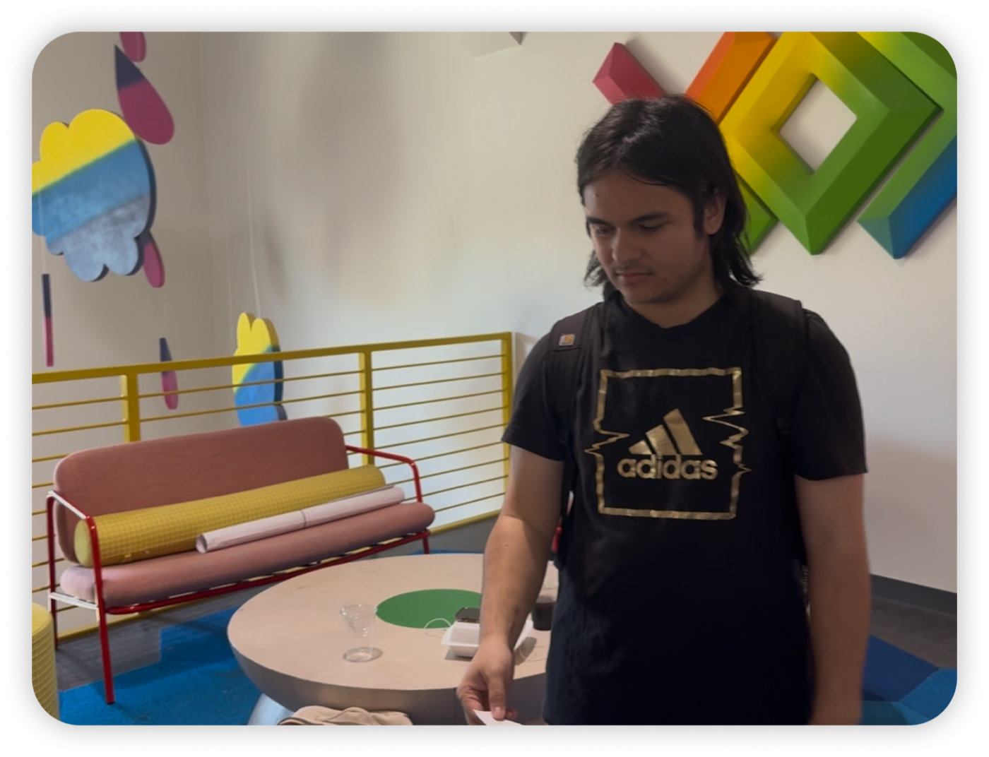 Participant approaching the post-service tipping station after receiving their item