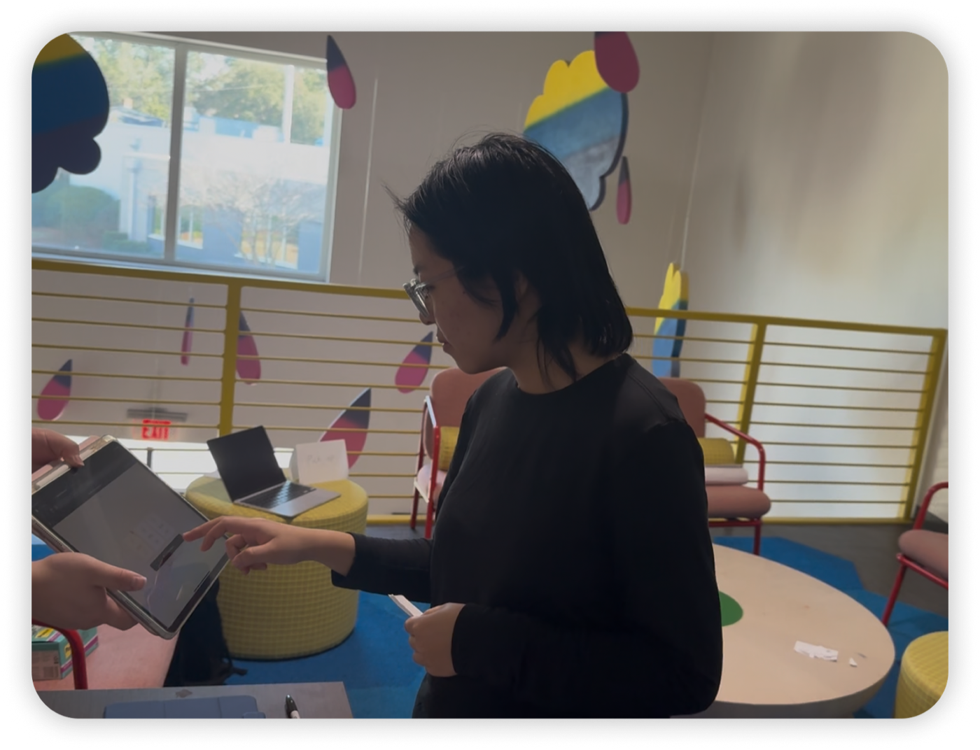 Participant interacting with the POS tablet at the reconstructed counter